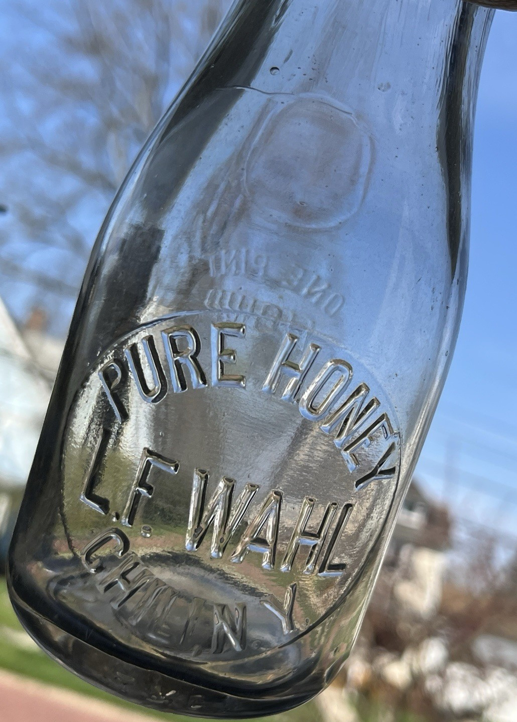 L.F. Wahl Pure Honey TRP milk bottle like container Chili N.Y. Monroe County pt