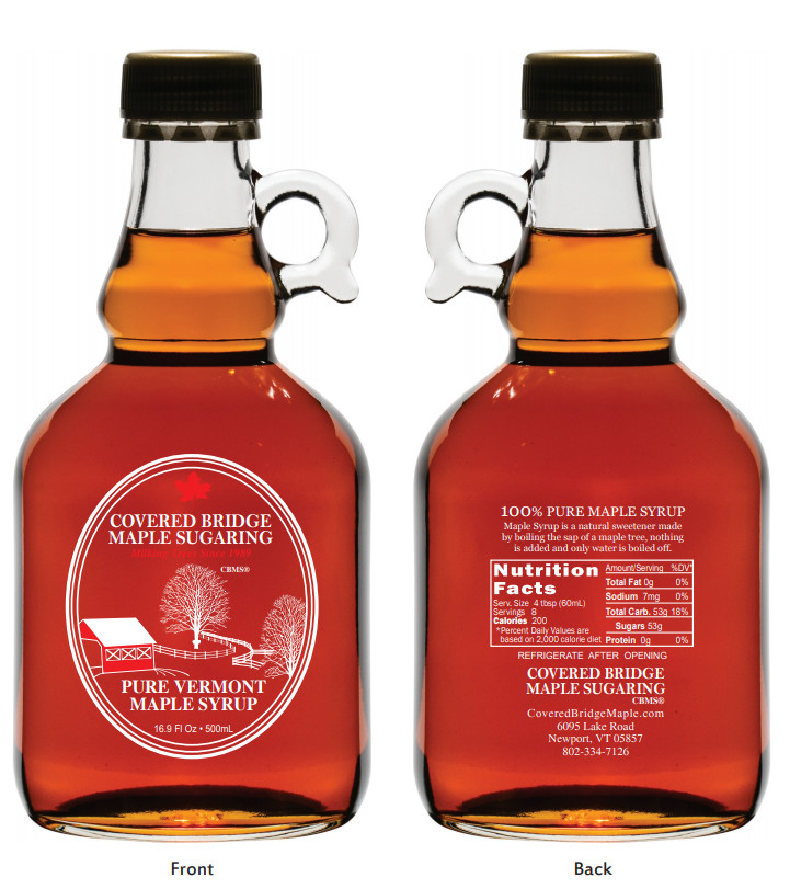 One 500 ml glass jug of pure Vermont «organic» Maple syrup