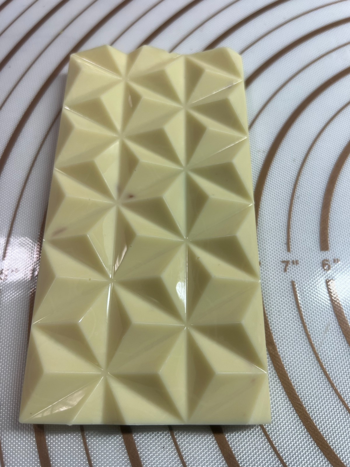 White Chocolate Bar Sweet & Sour taste Raspberry & Hazelnut on top 100g .