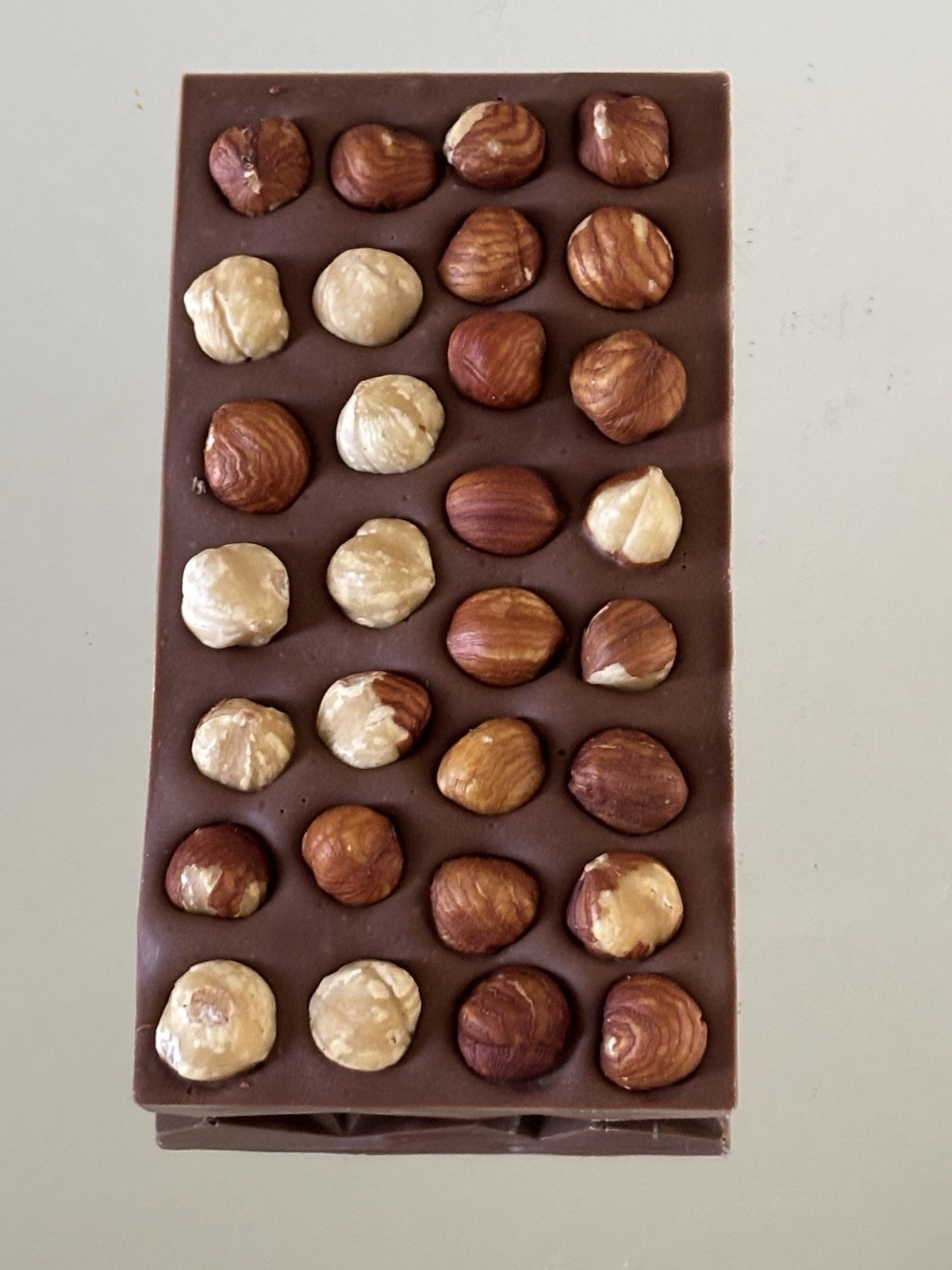 Handcrafted Belgian Milk Chocolate with Whole Roasted Hazelnuts – 100g