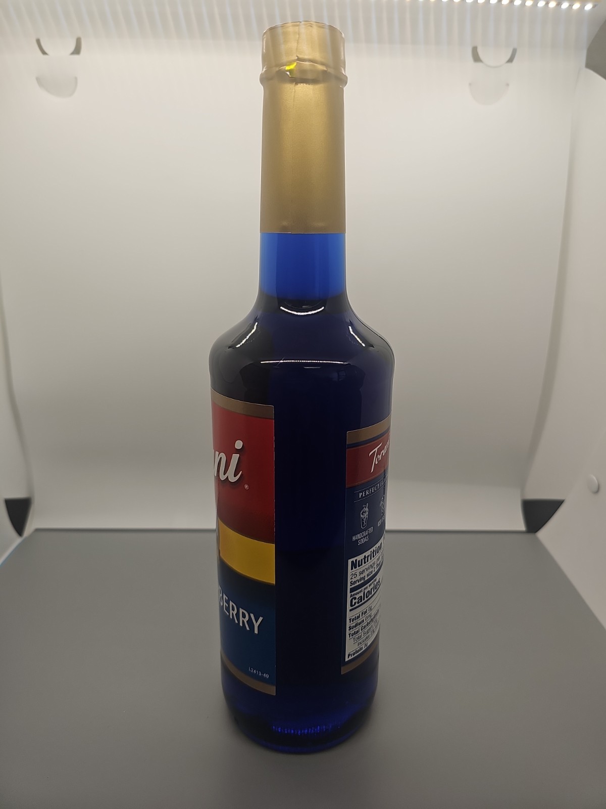 Torani Blue Raspberry Flavored Syrup. 25.4oz. Glass Bottle.