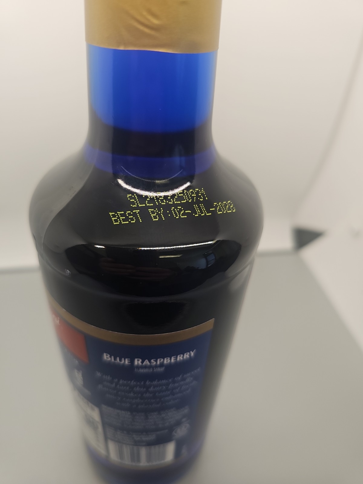 Torani Blue Raspberry Flavored Syrup. 25.4oz. Glass Bottle.