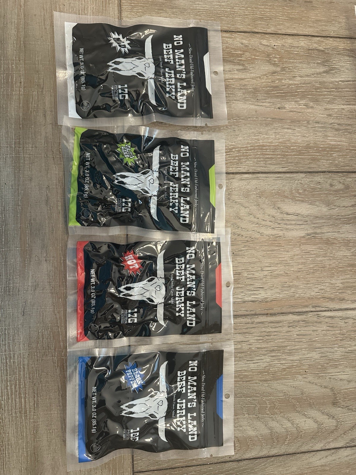 No Mans Land Beef Jerky Variety Pack. (4) 2.5 oz packs. BB 11/2026