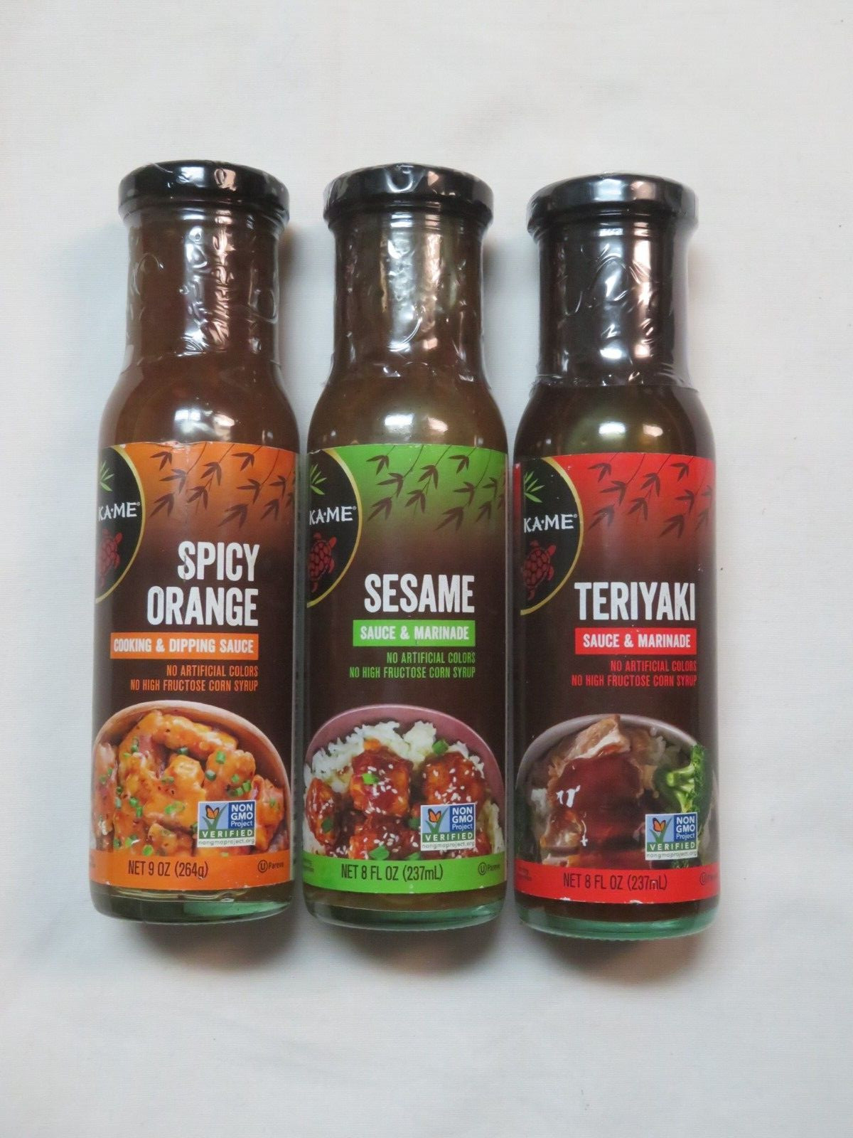 (3) Bottles Of KA-Me Sauce & Marinade Spicy Orange, Sesame & Teriyaki 8 Oz Each