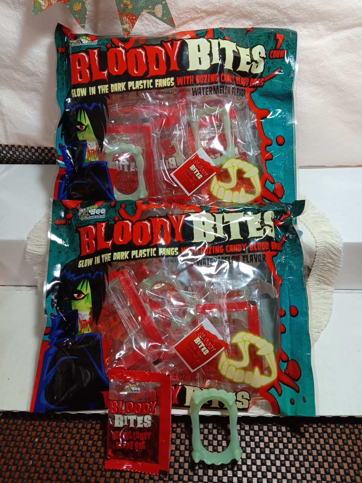2 BAGS- BLOODY BITES GLOW IN THE DARK PLASTIC VAMPIRE FANGS OOZING BLOOD CANDY!!