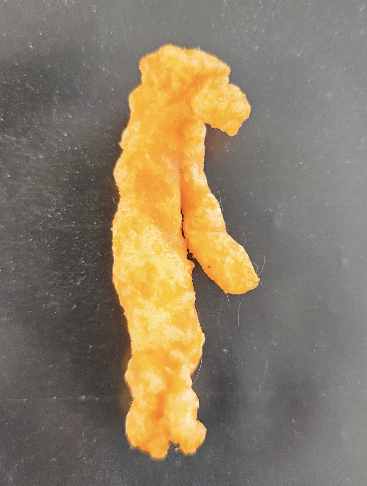 Original 2023 Cheetos Cheese Curls Image Shaped Like Bigfoot Tall Elongated Body